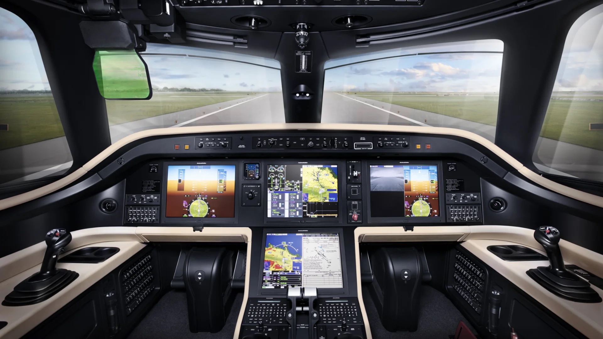 Business jet flight deck with glass avionics displays